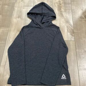 Reebok Long Sleeve Hooded Tee in Black. Size XS (6-8)